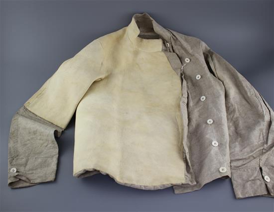 A late 19th century linen fencing jacket, with suede leather protect for body and arm for right handed fencer